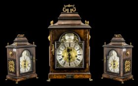 Walnut Bracket Clock with brass arch dial and canopy top.