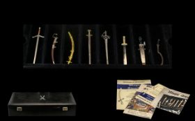 A Set of Magic Swords housed in a black presentation box with felt interior.