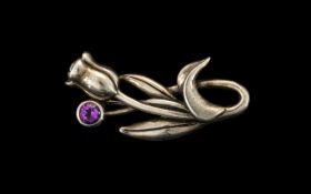 Art Nouveau Silver Brooch. Wonderful tulip design, set with amethysts. Hallmarked for silver.