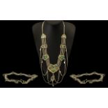 Ornate Belt & Necklace on white metal wi