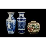 Two Small Blue and White Oriental Vases.