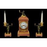 French Clock Garniture. A pink marble a