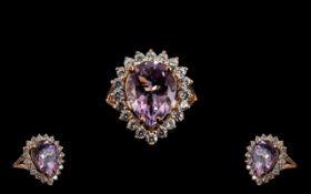 Rose de France Amethyst Statement Halo Ring, a 9.5ct pear cut Rose de France amethyst set slightly