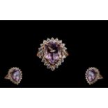 Rose de France Amethyst Statement Halo Ring, a 9.5ct pear cut Rose de France amethyst set slightly