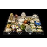 Large Collection of Decorative Ceramic & Metal Eggs & Boxes,