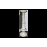 Alabaster Sectional Pedestal with a fluted column centre and round top,