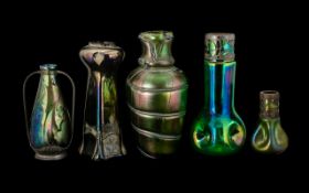 Five Loetz Type Green Iridescent Glass Vases one with pewter mounts. 7" high.