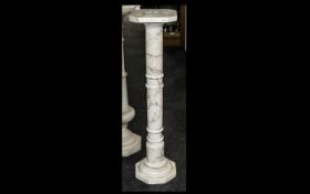 Alabaster Sectional Pedestal with a turned column centre supported by a hexagonal shaped base;