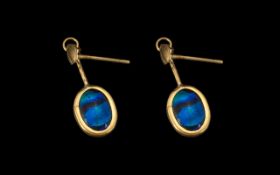 9ct Gold Opal Drop Earrings of vibrant colour. Please see accompanying image.