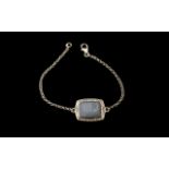 Angelite Centrepiece Bracelet, a 10ct cushion cut, rectangular cabochon of angelite,