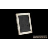 Silver Photo Frame of plain form,