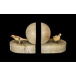 Art Deco Style Cream Marble Bookends, each half forming a globe shape when together,
