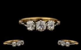 18ct Gold & Platinum 3 Stone Diamond Set Ring. Marked 18ct to interior of shank.