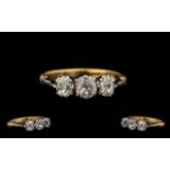 18ct Gold & Platinum 3 Stone Diamond Set Ring. Marked 18ct to interior of shank.