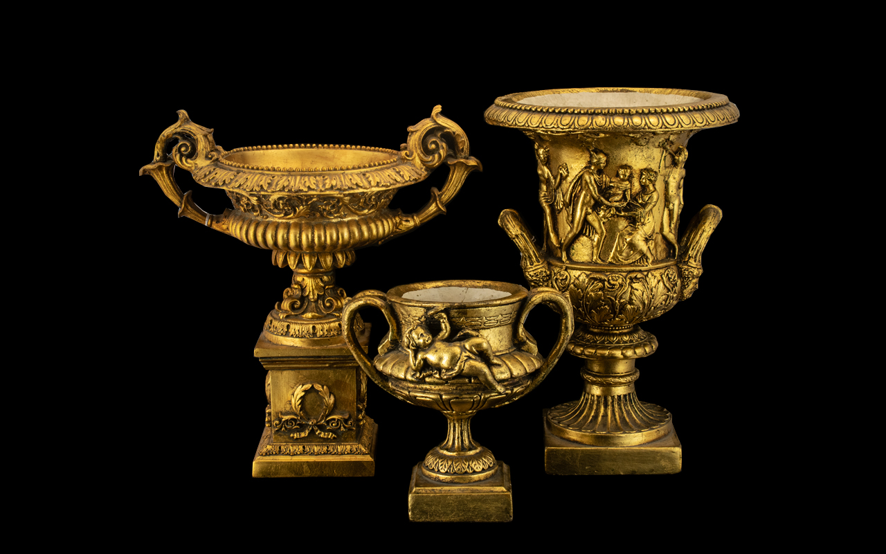 Three Gilded Floral Display Urns, in the Classical manner, after the Medici designs; 20thC; 14.