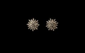 Diamond Sunburst Stud Earrings, baguette cut diamonds spreading out, in a sunburst formation,