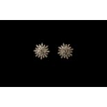 Diamond Sunburst Stud Earrings, baguette cut diamonds spreading out, in a sunburst formation,