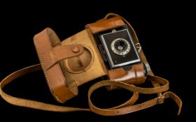 Vintage Kodak Bantam Camera in tan leather carry case. Please see image.