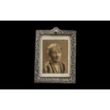 Victorian Silver Photo Frame of highly decorative design,