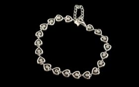 Silver Bracelet Silver Heart Shaped Bracelet, Each Heart Has CZ to Give Sparkle. Fully Hallmarked