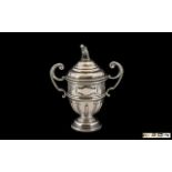 Silver Cricket Trophy, fully hallmarked for Birmingham 1930; vacant cartouche,