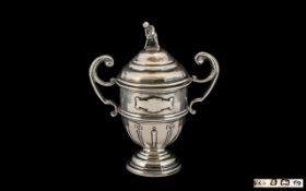 Silver Cricket Trophy, fully hallmarked for Birmingham 1930; vacant cartouche,