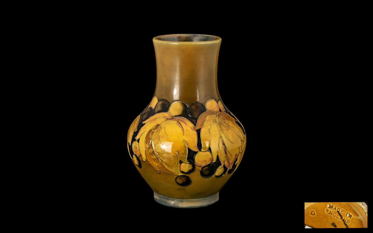 Moorcroft Tubelined Bulbous Shaped Small Vase 'leaves and berries' design.