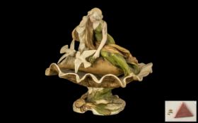Royal Dux Bohemia 19th Century Figural Centre Piece depicts a young classical maiden wearing long