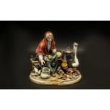 Capodimonte Statement Piece Woman Cooking Chestnuts.