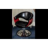 Black Leatherette Tub Chair on Chrome Base, barber style chair by Spindle, in black with red trim.