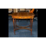 Edwardian Inlaid Mahogany Centre Table, the top decorated with ribbon swaggering,