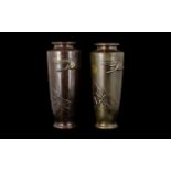 Pair of Matching Japanese Metal Vases with decorative embossed design of flying birds.
