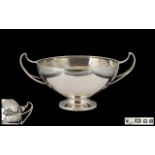 Art Deco Period and Good Quality Twin Handled Footed Bowl of plain form with superb stylised