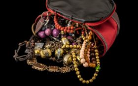 A Collection of 22 Statement Costume Jewellery Pieces all contained in a red case,