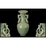 Small Chinese Celadon Glazed Vase of typical form,
