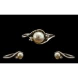 Ladies 9ct Pearl & Diamond Set White Gold Dress Ring. Ring size K.