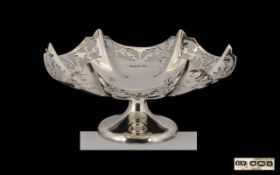 1930's Sterling Silver Ornate Pedestal Bowl of small proportions and pleasing design.