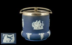 Wedgwood Blue Jasper Ware Biscuit Barrel of typical form iwth EPNS lid and handle.