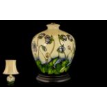 Moorcroft - Pleasing Tubelined Ovoid Shaped Lamp Vase ' Spring Flowers ' Design.