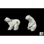 Two Lladro Porcelain Figures comprising Attentive Polar Bear with Flowers no 06354 and Polar Bear
