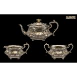 Victorian Period Elaborately Decorated 3 Piece Silver Tea Service of Excellent Form and Quality.
