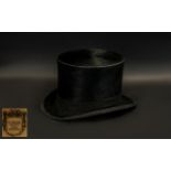 Black Top Hat with label 'D Craik, 100 Leith St,