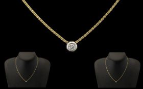 18ct Gold Diamond Pendant, diamond of good colour and sparkle, suspended on an 18ct gold chain. 16''