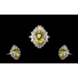 Ouro Verde Green Gold Quartz and Topaz Statement Ring, an oval cut natural green gold quartz of