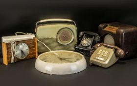 A Mixed Collection of Radios and Telephones to include Bush Radio, Smiths Astral Wall Clock,