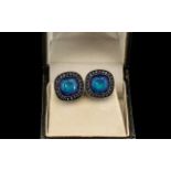 Pair of Vintage Signed Givenchy Clip On Earrings in a square shape with blue stone surrounded by