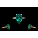 10ct Gold Ladies Pear Cut Topaz & Diamond Ring. Ring size P.