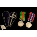 WW II War Medal and Defence Medal in original card box with papers,