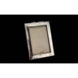 Planished Silver Photo Frame, fully hallmarked for Birmingham 1910; vacant cartouche,