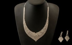 White Crystal Necklace and Earrings Set, the necklace, in a short V, closely covered with white